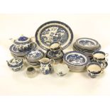 A quantity of Wedgwood blue and white printed Willow pattern dinner and tea wares including fourteen