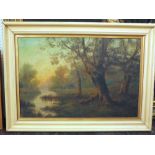 An early 20th century oil painting on canvas of a woodland scene with sheep grazing beside a stream,