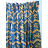 Collection of seven curtains in blue Heraldic Lion pattern all lined with pencil pleat headings,