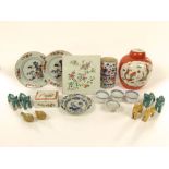 A collection of 19th century and other oriental ceramics including a tile with famille rose