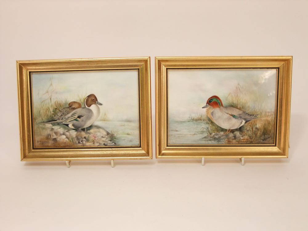 A pair of Royal Worcester plaques each painted with wildfowl and both signed A. Badham, 12cm x
