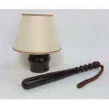 Serpentine ovoid lamp base together with an antique hardwood police truncheon (2)