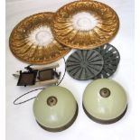 A pair of art deco style ceiling lanterns in opaque glass and brass, of circular compressed form,