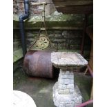 A vintage cast iron garden roller with T shaped handle and circular plaque with lettering Parsons