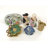 A collection of mainly 19th century ceramics including a tobacco jar and cover in the form of an