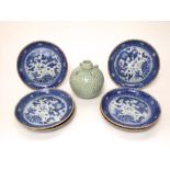 A set of six oriental blue and white dishes with dragon and flaming pearl decoration with six