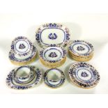 A collection of late 19th century Mintons dinner wares with blue and red printed decoration