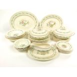 A quantity of Royal Doulton Fairfield pattern dinner wares comprising a pair of circular tureens and