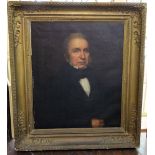 A 19th century oil painting on canvas half length portrait of a gentleman in black jacket and