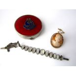 A silver bracelet set with graduating moonstones, together with a 9ct cameo brooch and an HMS Rodney