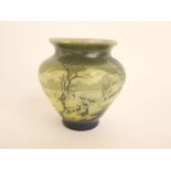 Attractive Cameo glass vase of baluster form decorated in relief with a winter landscape with deer