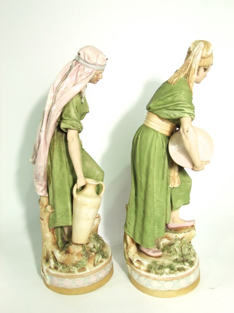 A pair of large early 20th century Royal Dux figures of male and female water carriers, both in - Image 4 of 4