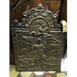 An early cast iron fire back dated 1679 with biblical scene detail, 80cm high x 60cm wide