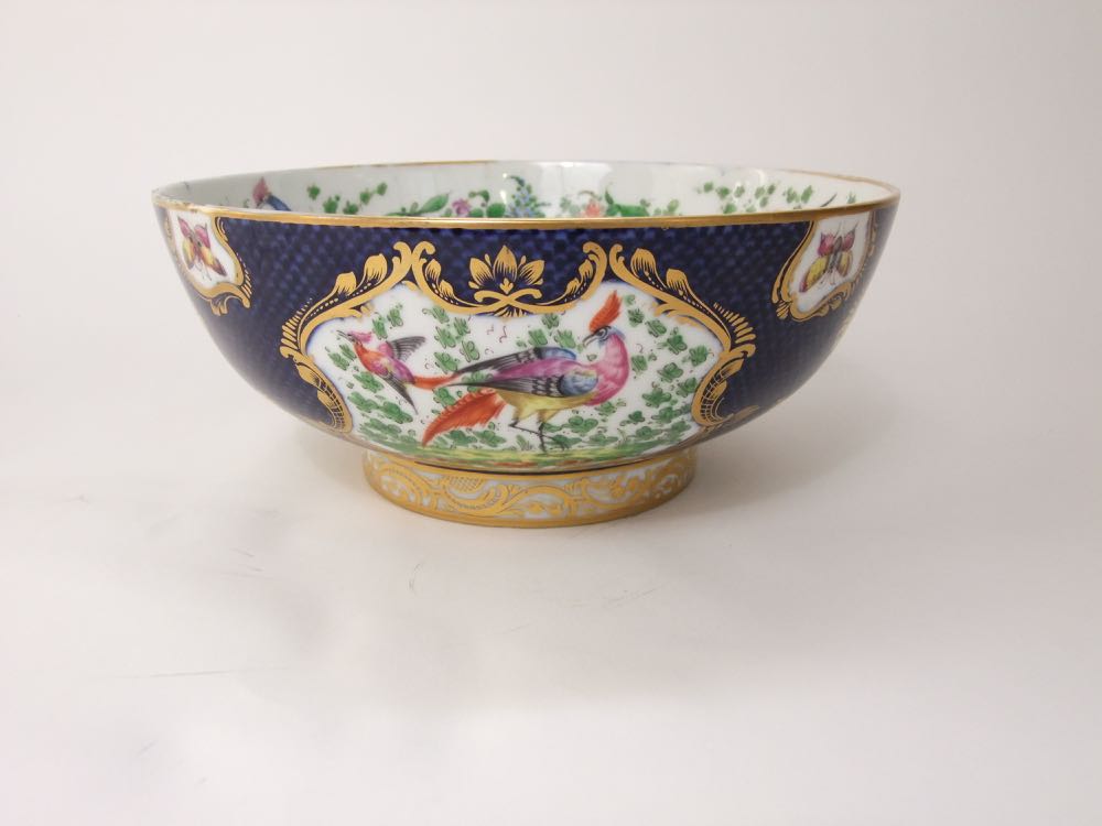 A 19th century punch or fruit bowl in the 18th century manner with blue scale ground and painted - Image 3 of 5