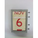 Vintage grey painted wall hanging perpetual date calendar, with month and day aperture, 27cm high