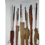 Six vintage fishing rods in carry cases to include Hardy's, C. Farlow & co of London and others