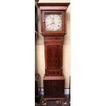 A Georgian mahogany longcase clock with inlaid detail, 30 hour movement, the trunk door flanked by