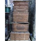 Four vintage pine packing crates with printed and painted lettering advertising Maple & Co Ltd