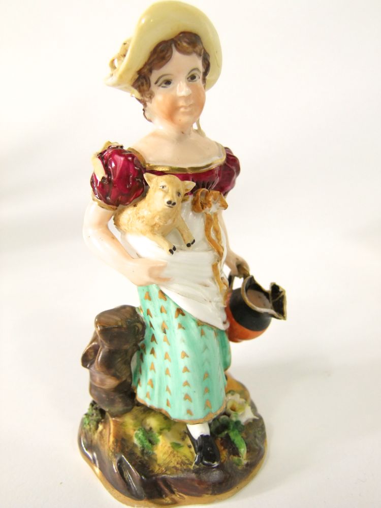 A pair of 19th century Staffordshire figures of male and female musicians accompanied by dogs, - Image 7 of 7