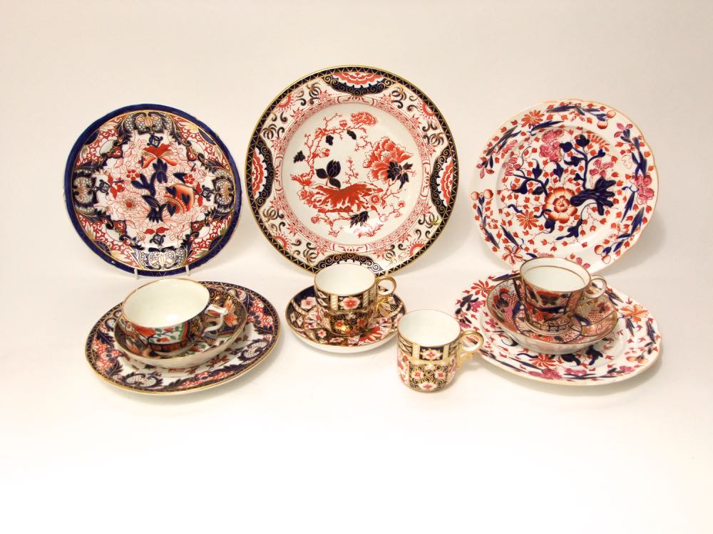 A collection of early 19th century and later tea and other wares with painted and gilded Imari