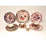 A collection of early 19th century and later tea and other wares with painted and gilded Imari