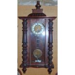 Vienna style two train wall clock fitted with an architectural case, gilt dial with enamel chapter