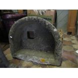 A natural stone D end trough