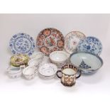 A collection of mainly 19th century ceramics including an imari charger, a continental tin glazed