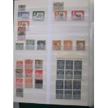 Three stockbooks containing a mint and used collection of British Commonwealth stamps from the