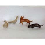 John Mainwaring - two signed wooden cats; together with Inuit birds (4)