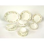 A quantity of Wedgwood Mirabelle pattern dinner wares comprising a pair of two handled tureens and