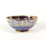 A Maling blue ground lustre fruit bowl with butterfly detail to the interior and dragonfly and other
