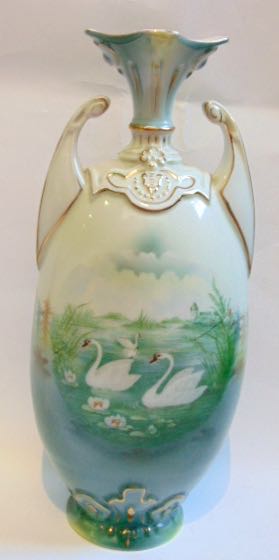 A pair of early 20th century two handled vases with swan decoration, a further continental vase with - Image 3 of 4