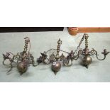 Three small old brass four branch chandeliers, 34cm high