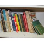 A collection of vintage and other children's books including two Eagle annuals, two stamp albums