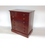 A Victorian stained pine six draw specimen cabinet upon a plinth base, 42 cm high approx.
