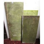 Three weathered marble slabs of rectangular form, the largest 107 cm x 38 cm