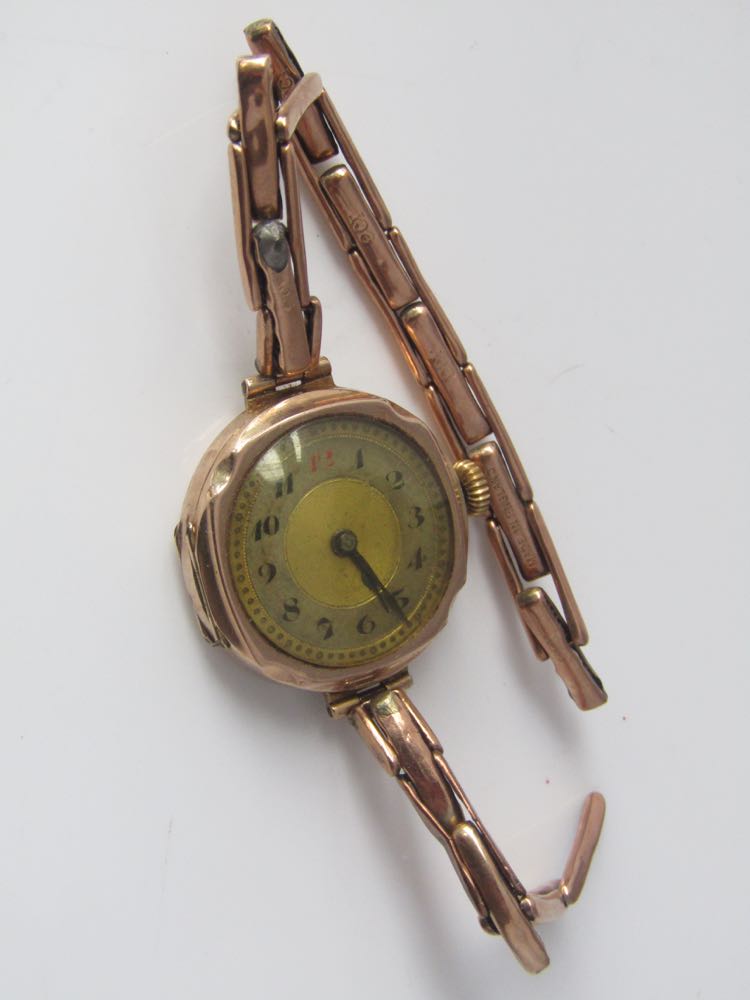 A vintage 9ct lughead rose gold bracelet watch with 9ct sprung strap