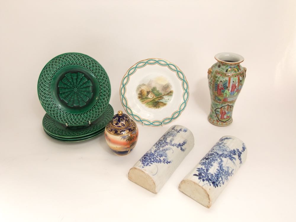 A set of four 19th century Minton's Majolica green glazed plates with basket weave style moulding