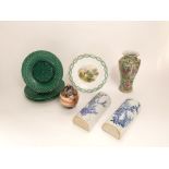 A set of four 19th century Minton's Majolica green glazed plates with basket weave style moulding