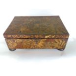 A 19th century work box with overlay of various leaves, the interior fitted with sectional two