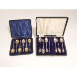 Cased sweet of six Albany tea spoons and a pair of sugar nips, together with a further cased set
