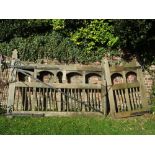 A reclaimed substantial weathered oak entrance gate with partially chamferred frame, open vertical