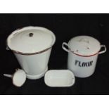 A collection of vintage enamel ware to include a lidded flour canister, a lidded bucket, pie tin and