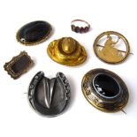 Six Victorian brooches including a yellow metal memorial brooch with plaited hair under glass, etc