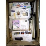 A box with a large quantity of GB and world stamps on covers