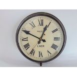 A vintage railway electric bakelite wall dial by Magneta, with 30cm dial