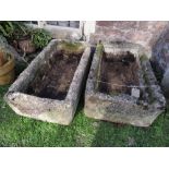 A near pair of weathered composition stone clad planters/troughs of rectangular form, 37 inches x 21