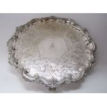 Large and impressive silver plated salver with cast acanthus scrolled rim over a bowl engraved