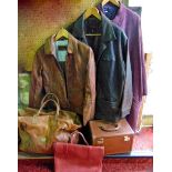 Two leather jackets and tweed overcoat together with a leather sports bag, a leather vanity case and